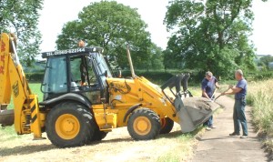 RAW staff laying an All Weather walkway for Chris Thornton's horses